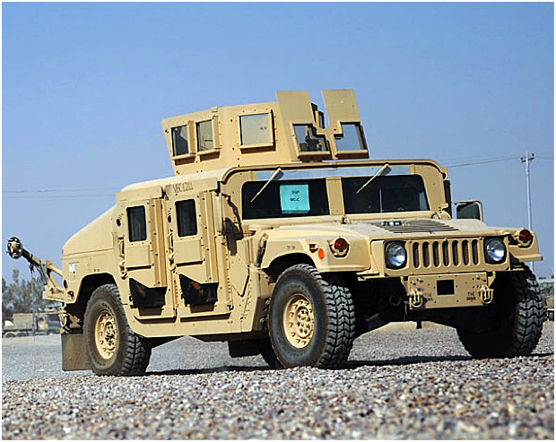 An Up-Armored Humvee with gun turret